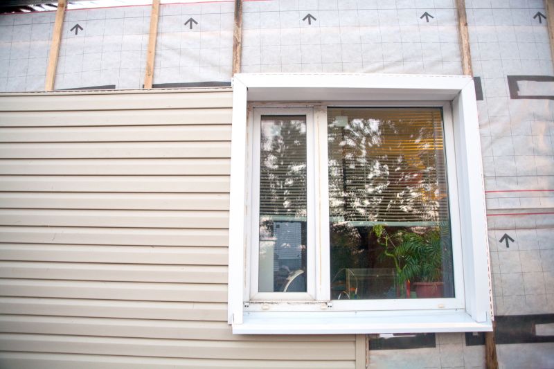 Applying Insulation Behind Siding